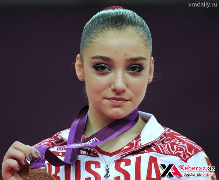 İdman gimnastikası üzrə Olimpiya çempionu Aliyə Mustafina Bakıya gəlir (FOTO)